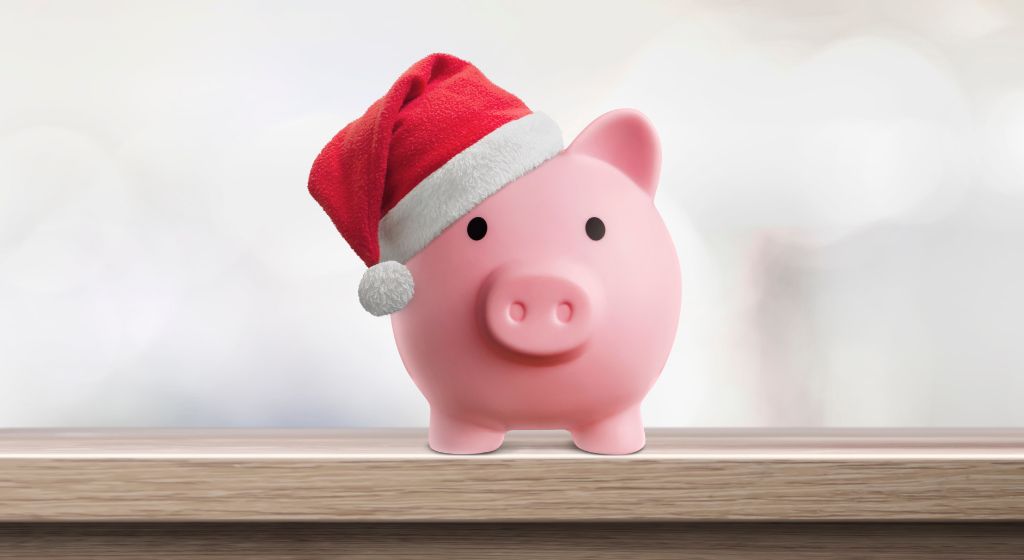 Piggy bank with Christmas hat