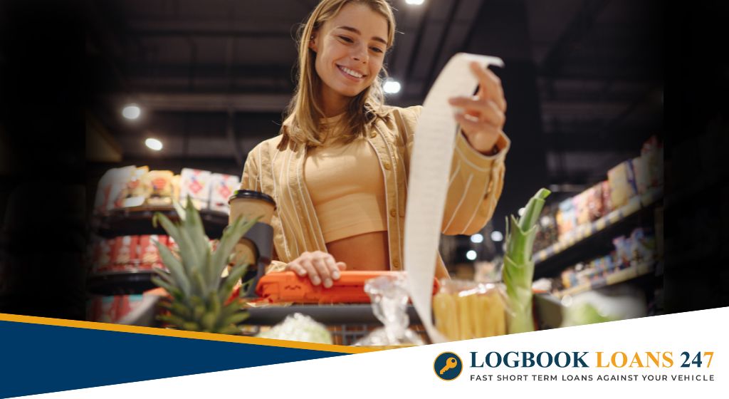 Young lady checking shopping receipt